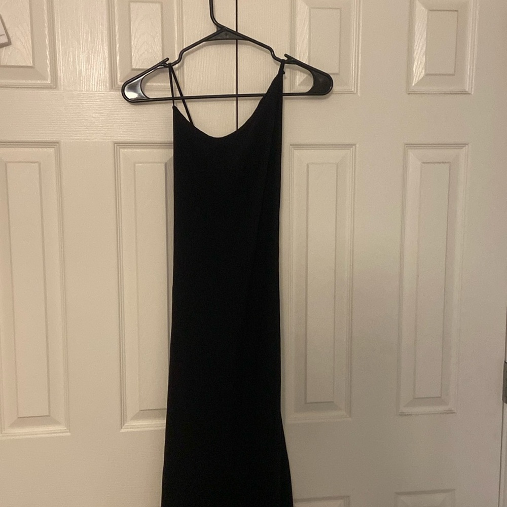 Zara dress. New with tags. Black with A-symmetrical neck. Size M